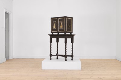 Lot 99 - An ebonised fruitwood, ivory-inlaid and bronze-mounted table cabinet