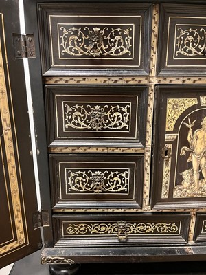 Lot 99 - An ebonised fruitwood, ivory-inlaid and bronze-mounted table cabinet