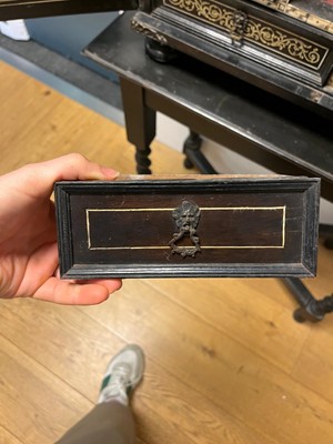 Lot 99 - An ebonised fruitwood, ivory-inlaid and bronze-mounted table cabinet