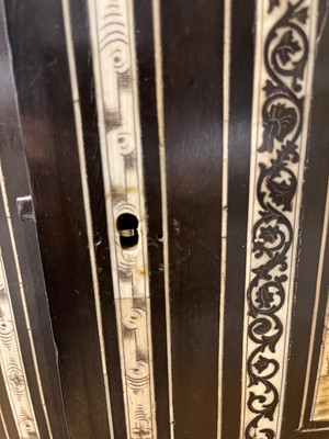 Lot 99 - An ebonised fruitwood, ivory-inlaid and bronze-mounted table cabinet