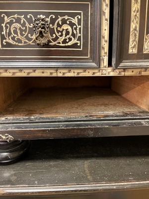 Lot 99 - An ebonised fruitwood, ivory-inlaid and bronze-mounted table cabinet