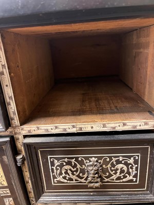 Lot 99 - An ebonised fruitwood, ivory-inlaid and bronze-mounted table cabinet
