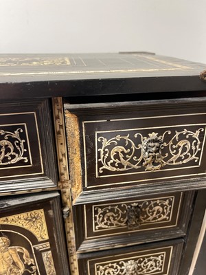 Lot 99 - An ebonised fruitwood, ivory-inlaid and bronze-mounted table cabinet