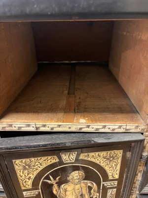 Lot 99 - An ebonised fruitwood, ivory-inlaid and bronze-mounted table cabinet