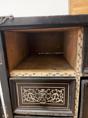 Lot 99 - An ebonised fruitwood, ivory-inlaid and bronze-mounted table cabinet
