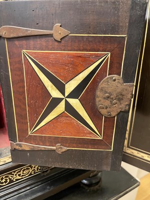 Lot 99 - An ebonised fruitwood, ivory-inlaid and bronze-mounted table cabinet