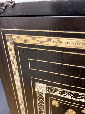 Lot 99 - An ebonised fruitwood, ivory-inlaid and bronze-mounted table cabinet