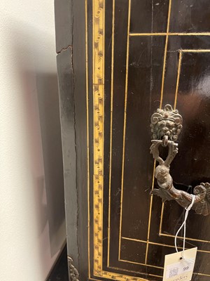 Lot 99 - An ebonised fruitwood, ivory-inlaid and bronze-mounted table cabinet