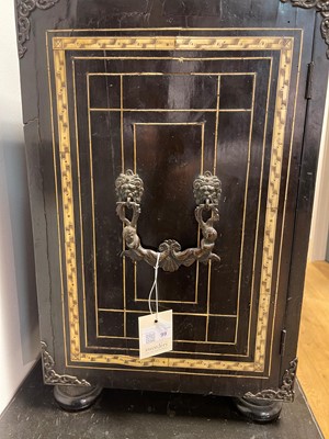 Lot 99 - An ebonised fruitwood, ivory-inlaid and bronze-mounted table cabinet