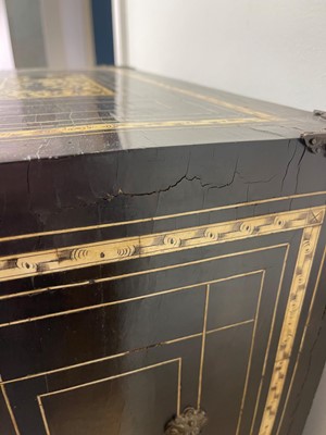 Lot 99 - An ebonised fruitwood, ivory-inlaid and bronze-mounted table cabinet