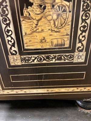 Lot 99 - An ebonised fruitwood, ivory-inlaid and bronze-mounted table cabinet