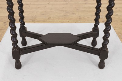 Lot 99 - An ebonised fruitwood, ivory-inlaid and bronze-mounted table cabinet