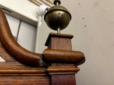 Lot 38 - An oak longcase clock
