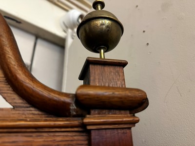 Lot 38 - An oak longcase clock