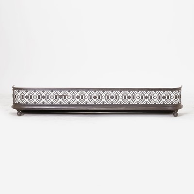 Lot 143 - A Regency polished steel fire kerb
