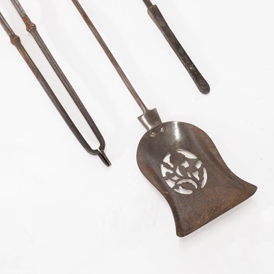 Lot 143 - A Regency polished steel fire kerb