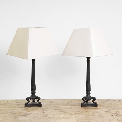 Lot 140 - A pair of Empire-style bronze lamps