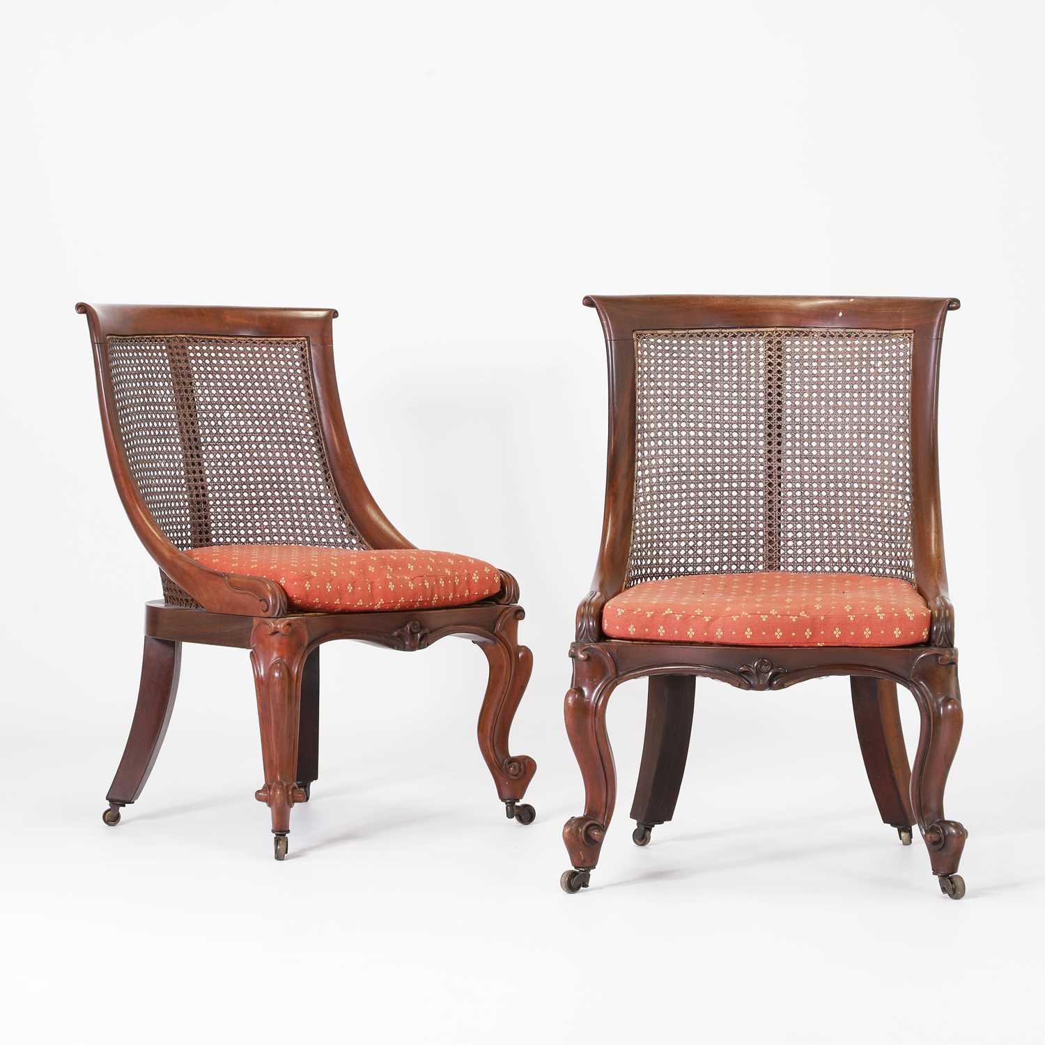 Lot 148 - A pair of William IV mahogany bergère chairs
