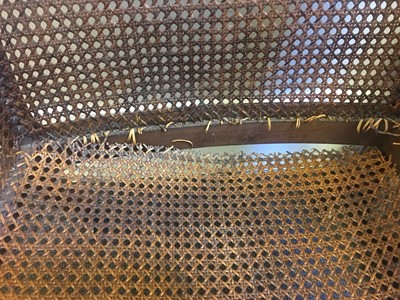 Lot 144 - A Regency mahogany bergère library chair