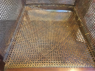 Lot 144 - A Regency mahogany bergère library chair