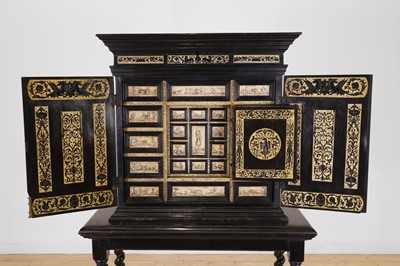Lot 100 - An ebonised fruitwood, ivory and bone cabinet