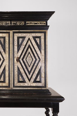 Lot 100 - An ebonised fruitwood, ivory and bone cabinet