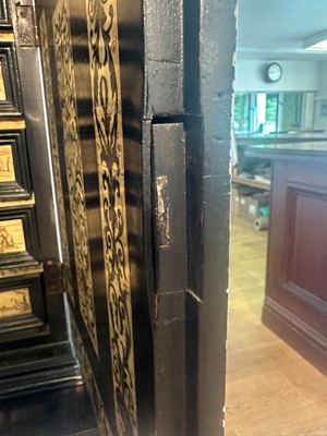 Lot 100 - An ebonised fruitwood, ivory and bone cabinet