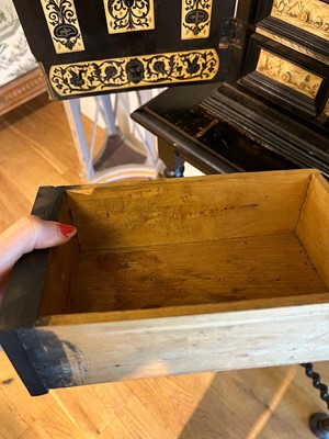 Lot 100 - An ebonised fruitwood, ivory and bone cabinet