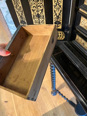 Lot 100 - An ebonised fruitwood, ivory and bone cabinet