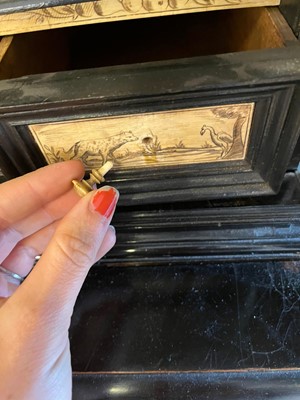 Lot 100 - An ebonised fruitwood, ivory and bone cabinet