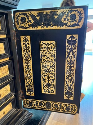 Lot 100 - An ebonised fruitwood, ivory and bone cabinet