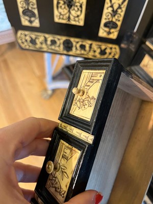 Lot 100 - An ebonised fruitwood, ivory and bone cabinet