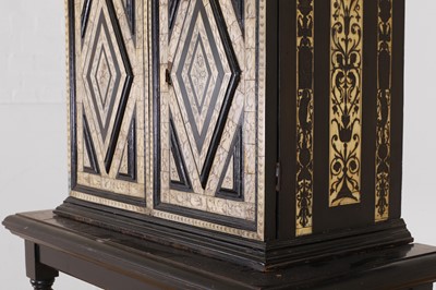 Lot 100 - An ebonised fruitwood, ivory and bone cabinet