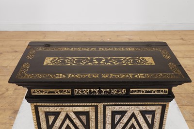 Lot 100 - An ebonised fruitwood, ivory and bone cabinet