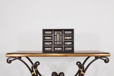 Lot 234 - An ebonised wooden and ivory table cabinet