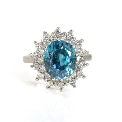 Lot 131 - A blue zircon and diamond cluster ring