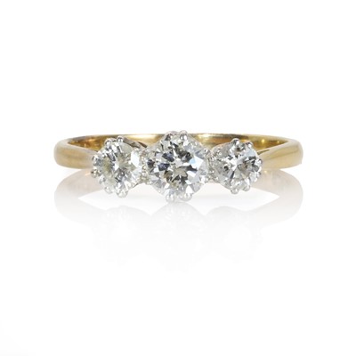 Lot 276 - A three stone diamond ring