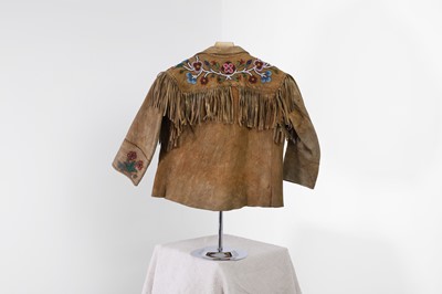 Lot 372 - A Native American beaded hide child's jacket