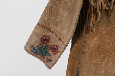 Lot 372 - A Native American beaded hide child's jacket