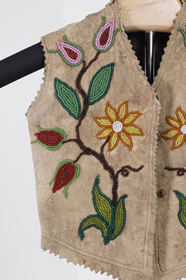 Lot 372 - A Native American beaded hide child's jacket