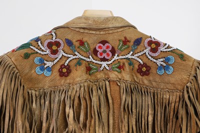 Lot 372 - A Native American beaded hide child's jacket