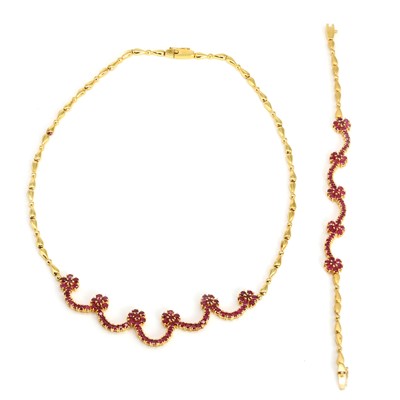 Lot 259 - A ruby florette necklace and bracelet set