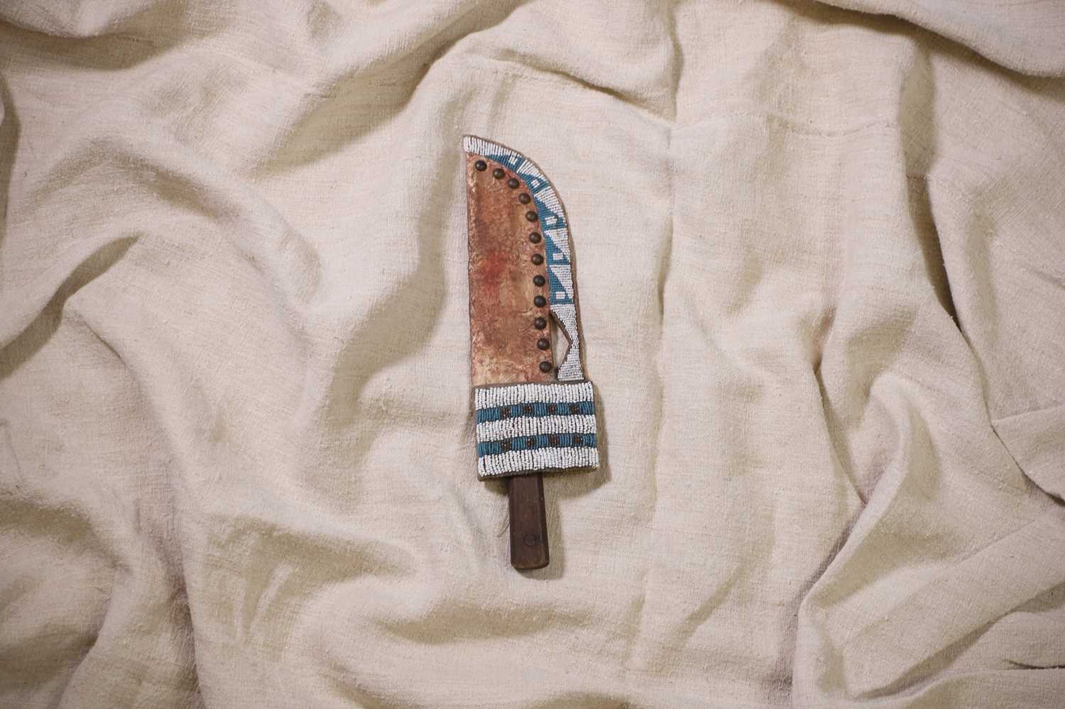 Lot 327 - A Native American beaded sheath and knife