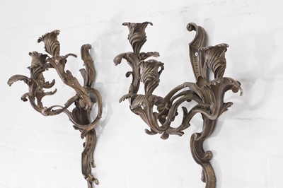 Lot 342 - A pair of Louis XV-style silvered-brass wall lights