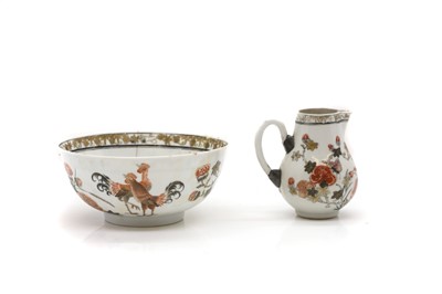 Lot 179 - A porcelain bowl and creamer