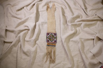 Lot 365 - A Native American beaded hide tobacco or pipe bag