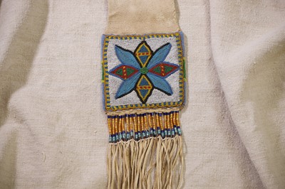 Lot 365 - A Native American beaded hide tobacco or pipe bag