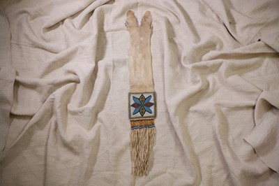 Lot 365 - A Native American beaded hide tobacco or pipe bag