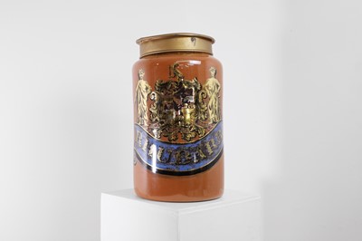 Lot 140 - A reverse-painted glass apothecary jar and cover