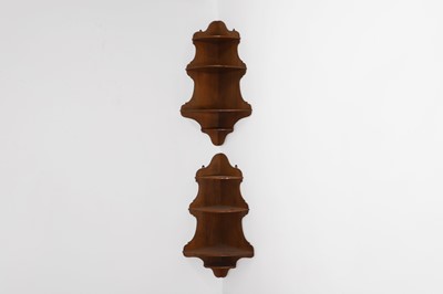 Lot 566 - A pair of Victorian walnut corner brackets